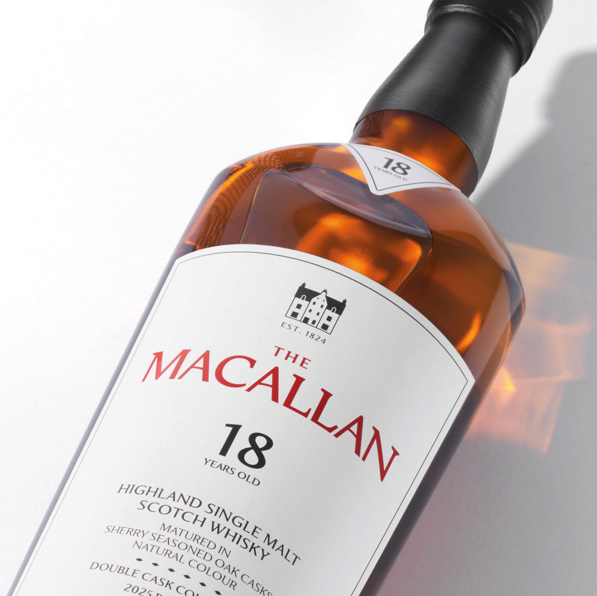 The Macallan 18-year-old whisky bottle on a white background