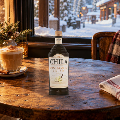 Chila Cinnamon Cream Rum latte window table - Liquor Geeks